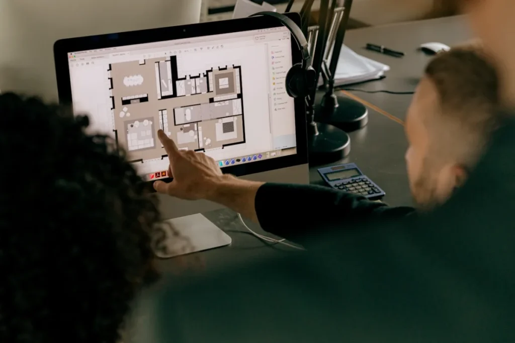 Image of discussion of a retail lease layout